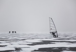 Hungarian olympian Laser sailor Zsombor Berecz (2008 Beijing - qualified 2012 London) ice surfing on the Lake Balaton. - Ice surfing on the Lake Balaton, Hungary photo copyright Gabor Turcsi taken at  and featuring the  class