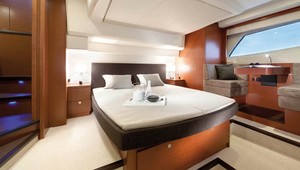 The owner's stateroom with private entrance photo copyright Prestige Luxury Motor Yachts taken at  and featuring the  class