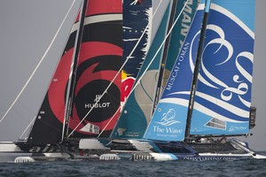 Day 3 - The fleet flying their hulls in full battle. The Wave Muscat - Extreme Sailing Series 2012. Act 1 photo copyright Lloyd Images http://lloydimagesgallery.photoshelter.com/ taken at  and featuring the  class