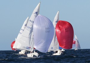 Etchells World Championship Sydney Australia 2012.  Mark Bulks racing Perfect Balance leading into the finish line with Tom KIng (Iron Lotus) and Brett Ellis (Ticket of Leave) chasing in second and third. photo copyright Ingrid Abery http://www.ingridabery.com taken at  and featuring the  class