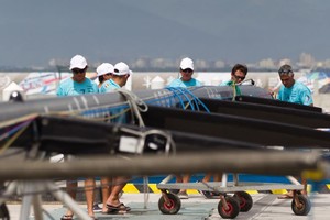 Team Telefonica change their rigging, prior to the start of the Sanya Haitang Bay In Port Race - Volvo Ocean Race 2011-12 photo copyright Ian Roman/Volvo Ocean Race http://www.volvooceanrace.com taken at  and featuring the  class