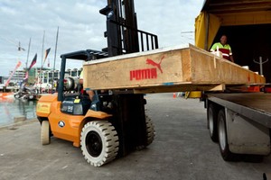 PUMA Ocean Racing take delivery from DHL of a new daggerboard in Auckland, New Zealand. - Volvo Ocean Race 2011-12 photo copyright Ian Roman/Volvo Ocean Race http://www.volvooceanrace.com taken at  and featuring the  class