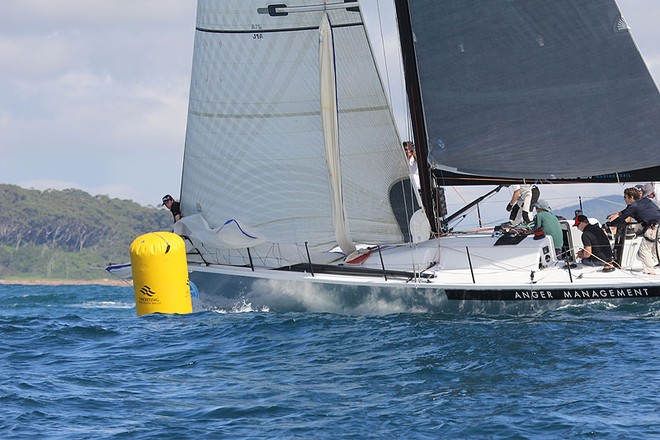Anger Management rounds the top mark in the first race of the day. - Sail Port Stephens &copy;  John Curnow