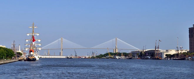 The 191-foot Barquentine Dewaruci (Surbaya, Indonesia) and Nova Scotia’s Theodore Tug docked in Savannah, Ga., with the Talmadge Bridge in the background for Tall Ships America’s 2012 Tall Ships Challenge © Jennifer Spring http://www.tallshipsamerica.org/