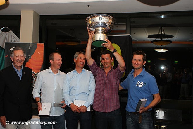 That’ll be the silverware - Sir Jim Hardy KBE OBE, David Edwards, Ivan Wheen, Tom King (trophy aloft) and Owen McMahon - Etchells World Championship 2012 © Ingrid Abery http://www.ingridabery.com