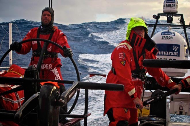 Skipper Chris Nicholson helming in huge seas, onboard CAMPER with Emirates Team New Zealand during leg 5 of the Volvo Ocean Race 2011-12, from Auckland, New Zealand to Itajai, Brazil.  © Hamish Hooper/Camper ETNZ/Volvo Ocean Race