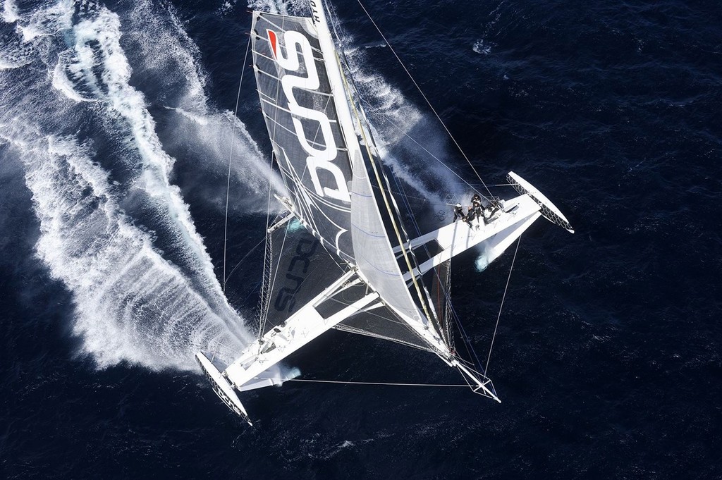 l’Hydroptere with her hinged hydrofoils both deployed. in the AC34 only one daggerboard foil may be deployed at a time except while tacking or doings a mark rounding. © Francis Demange www.hydroptere.com