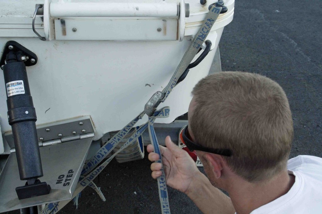 Remove all tie downs from the transom. © Jarrod Day