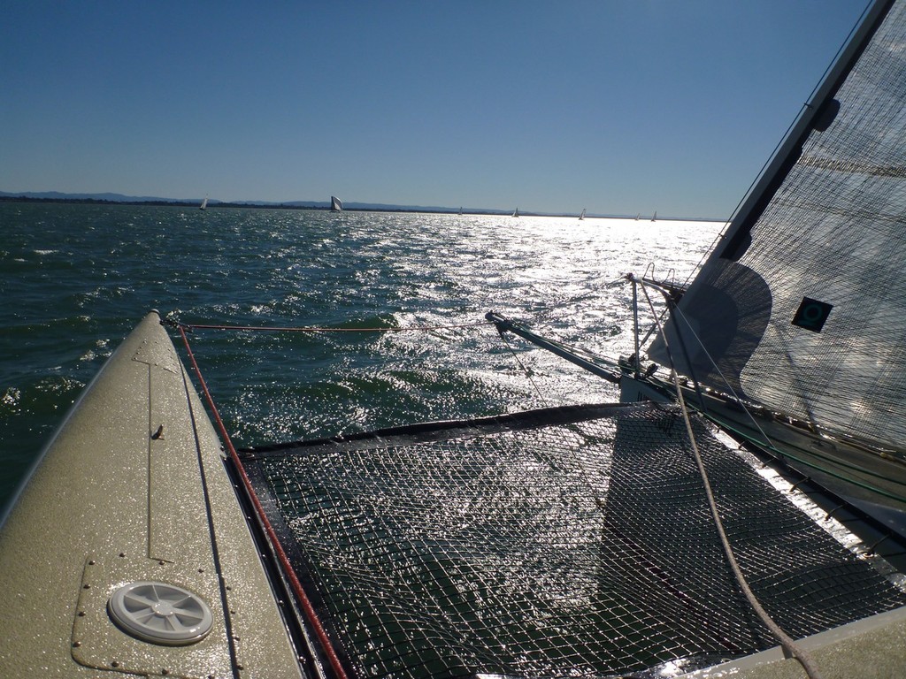 Every skipper's dream, driving hard into flat water and solid breeze - QCYC Winter Series © Rachel Hackett