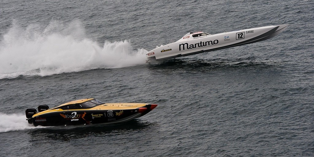 As 'Kwozzy 2' found out, a good big one will always beat a good little one - Maritimo-Mainlube Express soars past on its way to a Supercat 1000hp victory off Newcastle. - Newcastle Offshore photo copyright Andrew Gricks http://www.andrewgricksphotography.com taken at  and featuring the  class