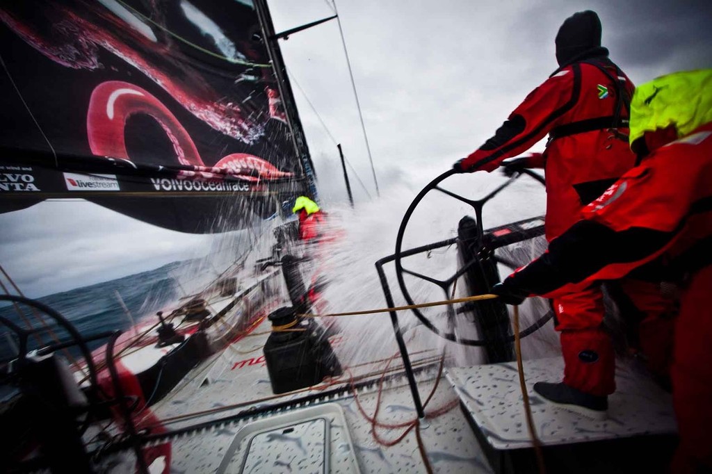 Jono Swain on the helm in fast downwind conditions. PUMA Ocean Racing powered by BERG during leg 5 of the Volvo Ocean Race 2011-12 © Amory Ross/Puma Ocean Racing/Volvo Ocean Race http://www.puma.com/sailing