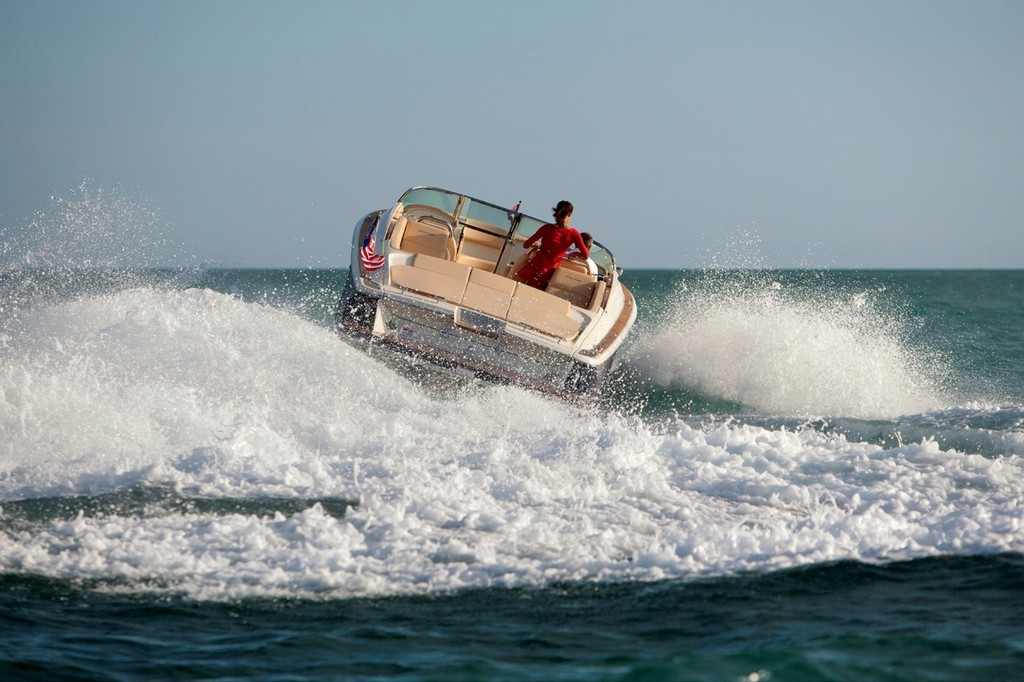 Rough water? No problem for this beauty. - Chris Craft Launch 32 photo copyright Forest Johnson taken at  and featuring the  class