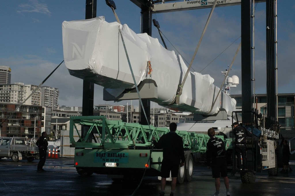 Emirates Team New Zealand - One of two hulls (stern to the left) arrives in the Viaduct Harbour, Auckland. photo copyright Emirates Team New Zealand http://www.etnzblog.com taken at  and featuring the  class