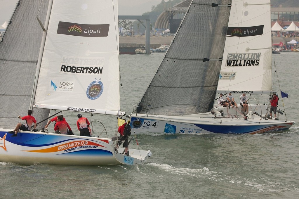 Ian Williams chasing down top qualifier Phil Robertson - WMRT Korea Cup 2012 photo copyright Andrew Carter/AWMRT taken at  and featuring the  class