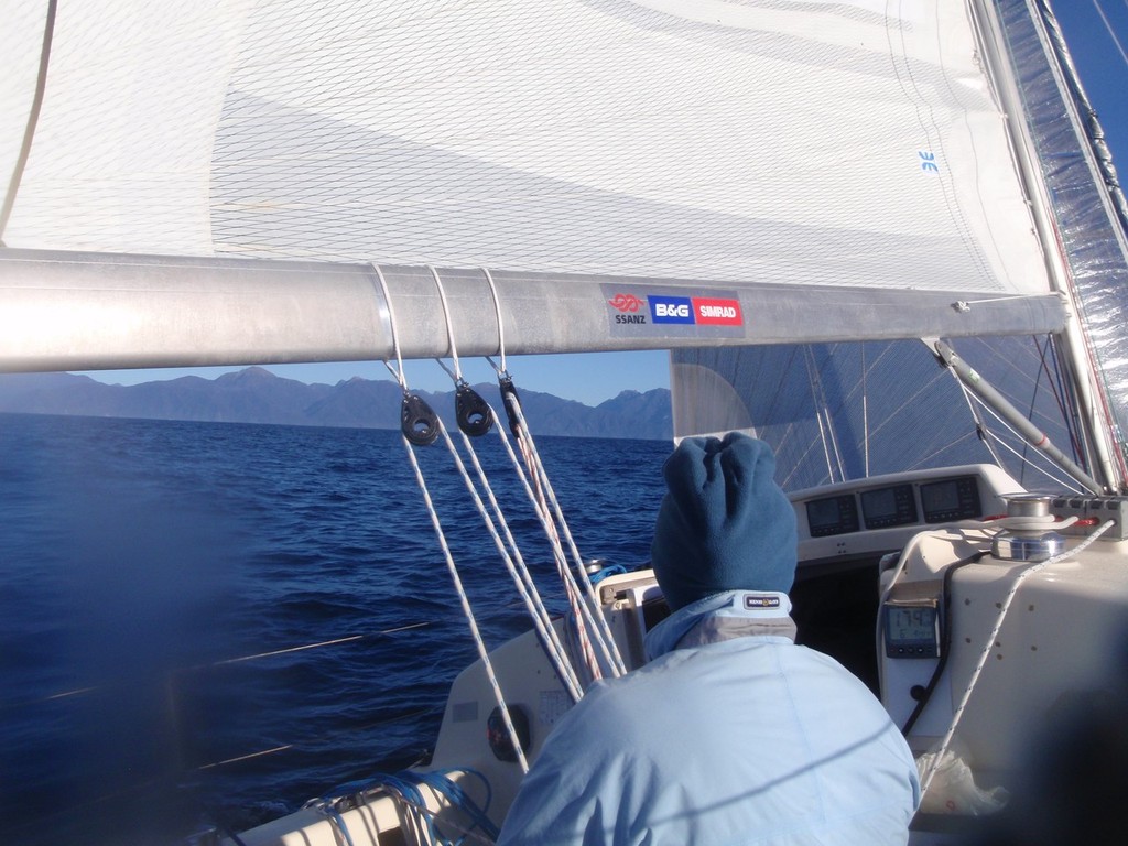 Sally steers close to Dusky Sound - 2012 Two Handed Round New Zealand Race - Expedition Coppelia photo copyright SW taken at  and featuring the  class