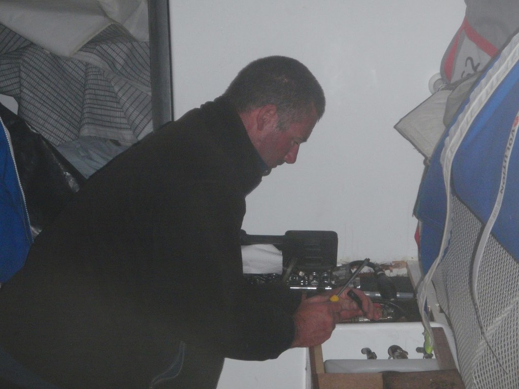 Changing over to the spare fuel tank, after getting contamination on the main tank  - 2012 Two Handed Round New Zealand Race - Expedition Coppelia © SW