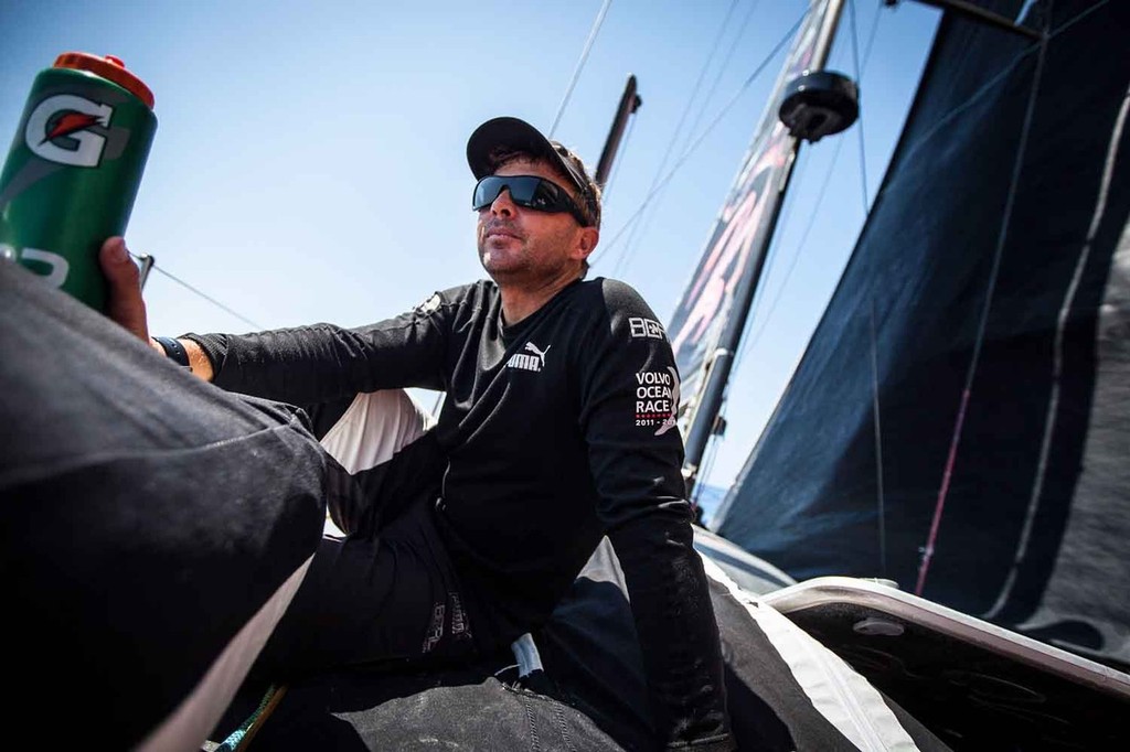Kelvin Harrap enjoying some light-air downtime on the bow. (Credit: Amory Ross/PUMA Ocean Racing/Volvo Ocean Race)  © Amory Ross/Puma Ocean Racing/Volvo Ocean Race http://www.puma.com/sailing
