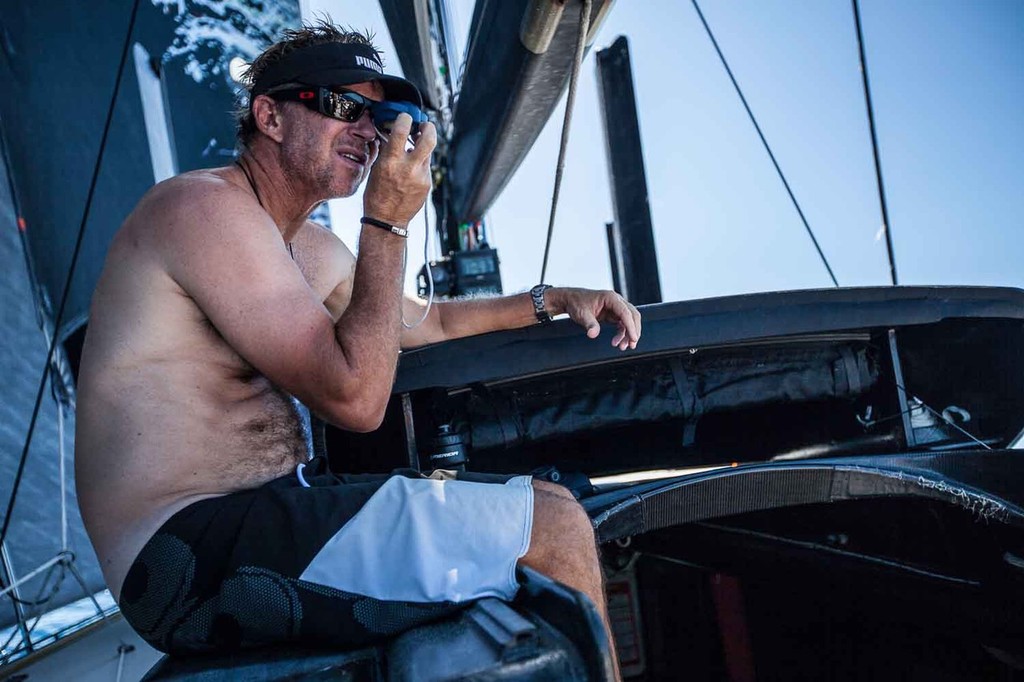 Ken Read keeps an eye on CAMPER with a hand bearing compass. Onboard PUMA Ocean Racing powered by BERG during leg 6 of the Volvo Ocean Race 2011-12, from Itajai, Brazil, to Miami, USA. (Credit: Amory Ross/PUMA Ocean Racing/Volvo Ocean Race)  © Amory Ross/Puma Ocean Racing/Volvo Ocean Race http://www.puma.com/sailing