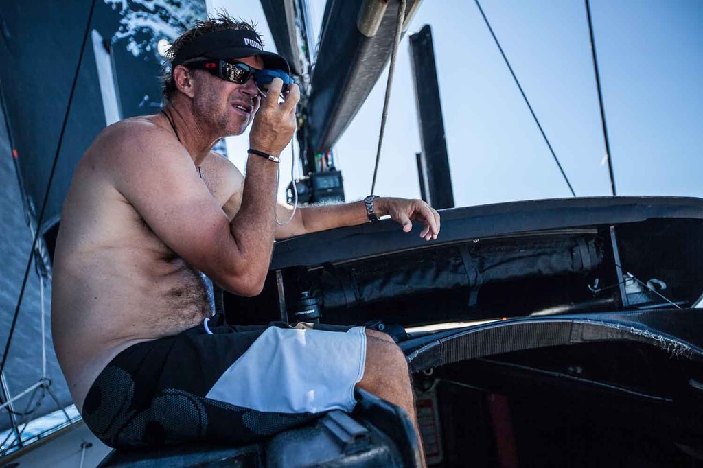 Ken Read keeps an eye on CAMPER with a hand bearing compass. Onboard PUMA Ocean Racing powered by BERG during leg 6 of the Volvo Ocean Race 2011-12, from Itajai, Brazil, to Miami, USA. (Credit: Amory Ross/PUMA Ocean Racing/Volvo Ocean Race) photo copyright Amory Ross/Puma Ocean Racing/Volvo Ocean Race http://www.puma.com/sailing taken at  and featuring the  class