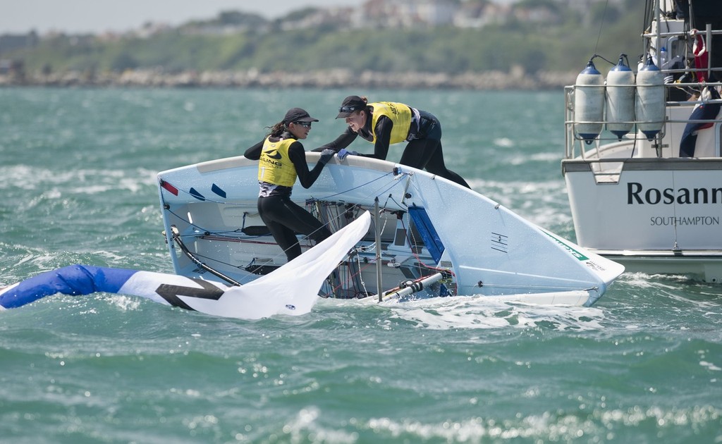 Jo Aleh and Olivia Polly Powrie (NZL) Gold medal winners capsize after the Medal race in the 470 Women class on day 6 of the Skandia Sail for Gold Regatta, in Weymouth  © onEdition http://www.onEdition.com