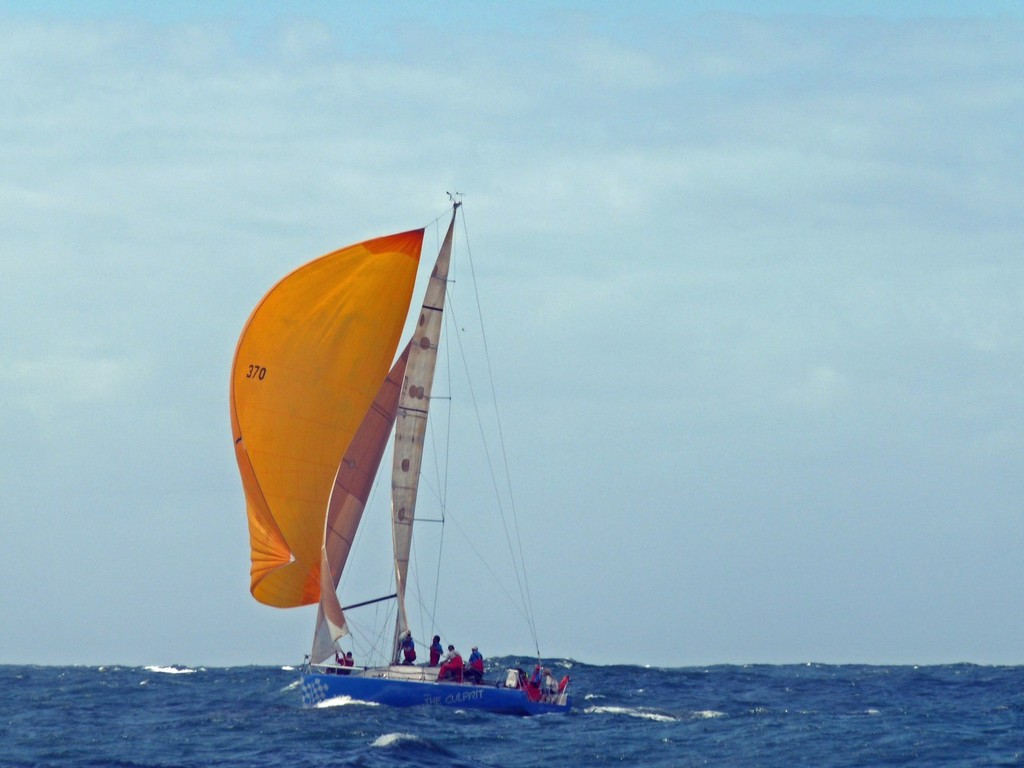 She’s The Culprit with her spinnaker Set and trundling off downwind. Newcastle Cruising Yacht Club and Lake Macquaire Yacht Club Combined Ocean Series photo copyright Greg Jackson taken at  and featuring the  class