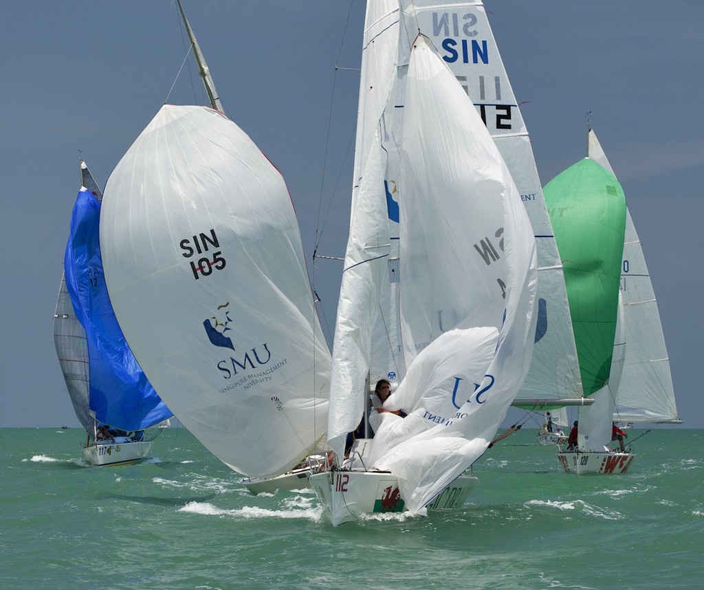 Top of the Gulf Regatta 2012 - SMU crews duke it out at the bottom mark photo copyright Guy Nowell/Top of the Gulf taken at  and featuring the  class