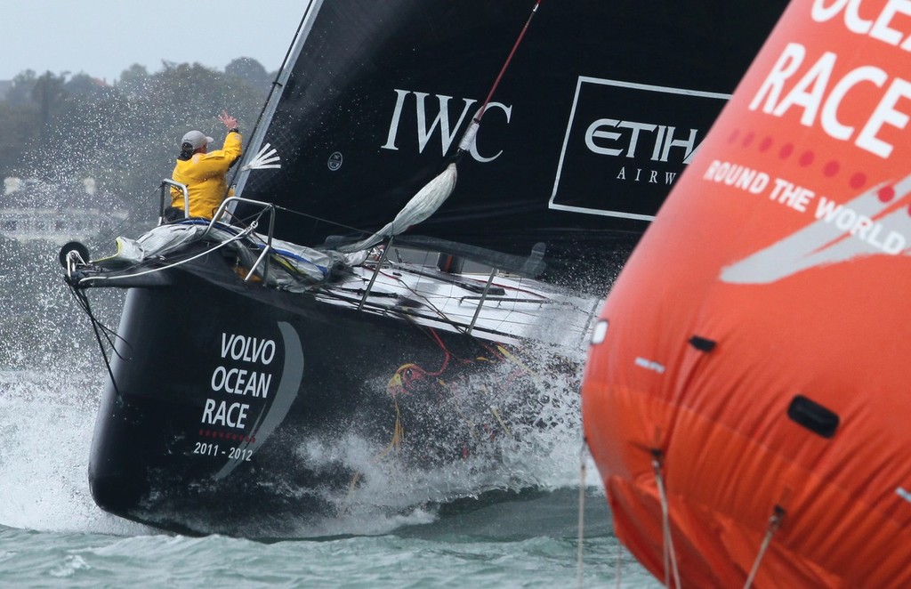 Abu Dhabi’s bowman signals the hoist as they reach the first mark in the Leg 5 start - Volvo Ocean Race 2012 © Crosbie Lorimer http://www.crosbielorimer.com