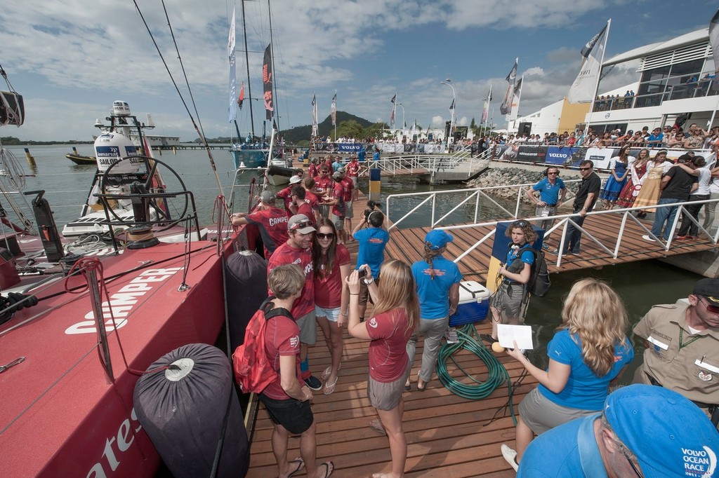 Camper with Emirates Team New Zealand’s crew are greeted by family and interviewed by the media, after finishing leg 5 of the Volvo Ocean Race 2011-12, from Auckland, New Zealand, to Itajai, Brazil.  © Paul Todd/Volvo Ocean Race http://www.volvooceanrace.com