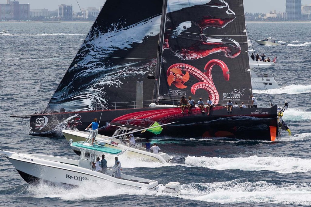 Leaders PUMA Ocean Racing powered by BERG, skippered by Ken Read from the USA, are followed in by media and spectator boats to the finish line of leg 6 from Itajai, Brazil, to Miami, USA, during the Volvo Ocean Race 2011-12. © Ian Roman/Volvo Ocean Race http://www.volvooceanrace.com