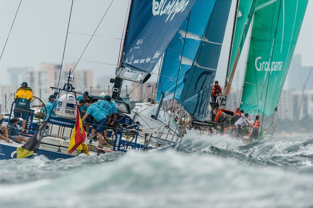 Team Telefonica, skippered by Iker Martinez from Spain chase Groupama Sailing Team, in the PORTMIAMI In-Port Race, during the Volvo Ocean Race 2011-12. (Credit: PAUL TODD/Volvo Ocean Race) photo copyright Paul Todd/Volvo Ocean Race http://www.volvooceanrace.com taken at  and featuring the  class