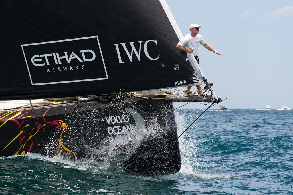 Abu Dhabi Ocean Racing bowman Justin Slattery from Ireland, on the bowsprit, at the start of leg 7 from Miami, USA to Lisbon, Portugal, during the Volvo Ocean Race 2011-12. (Credit: IAN ROMAN/Volvo Ocean Race) © Ian Roman/Volvo Ocean Race http://www.volvooceanrace.com