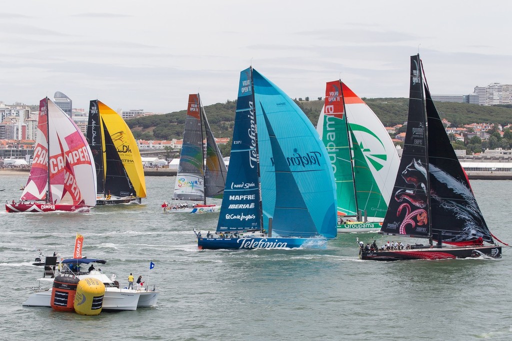 Telefonica (blue sails) establishes an overlaop to leeward of Puma soon after theb start of the Oeiras In-Port Race in Lisbon, during the Volvo Ocean Race 2011-12.  © Ian Roman/Volvo Ocean Race http://www.volvooceanrace.com