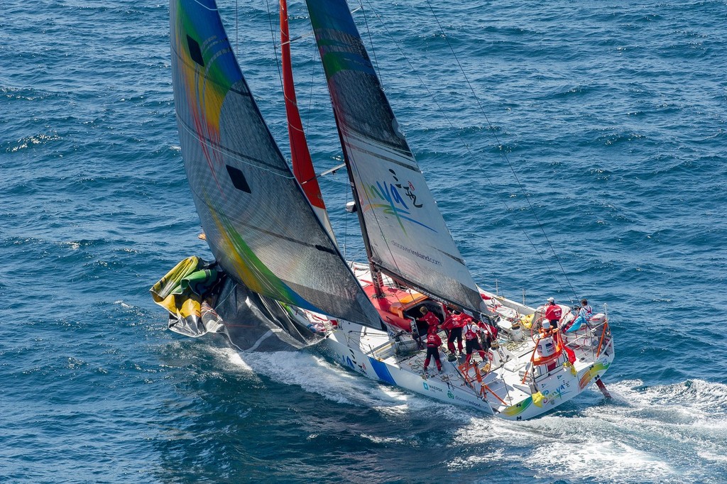 Team Sanya changing sails, at the start of leg 8 from Lisbon, Portugal to Lorient, France, during the Volvo Ocean Race 2011-12.  © Paul Todd/Volvo Ocean Race http://www.volvooceanrace.com