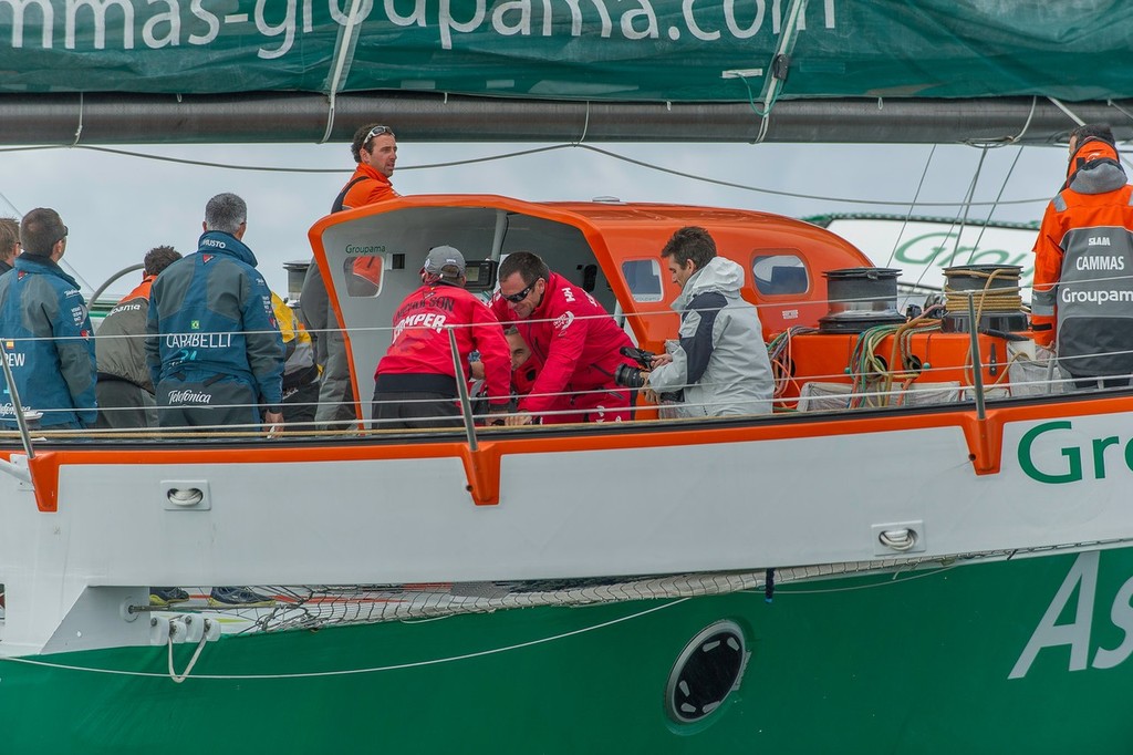 Skippers Chris Nicholson and Mike Sanderson grinding while Franck Cammas drives the Groupama 3 Trimiran. Lorient stop over Volvo Ocean Race 2011-12. (Credit: PAUL TODD/Volvo Ocean Race) photo copyright Paul Todd/Volvo Ocean Race http://www.volvooceanrace.com taken at  and featuring the  class