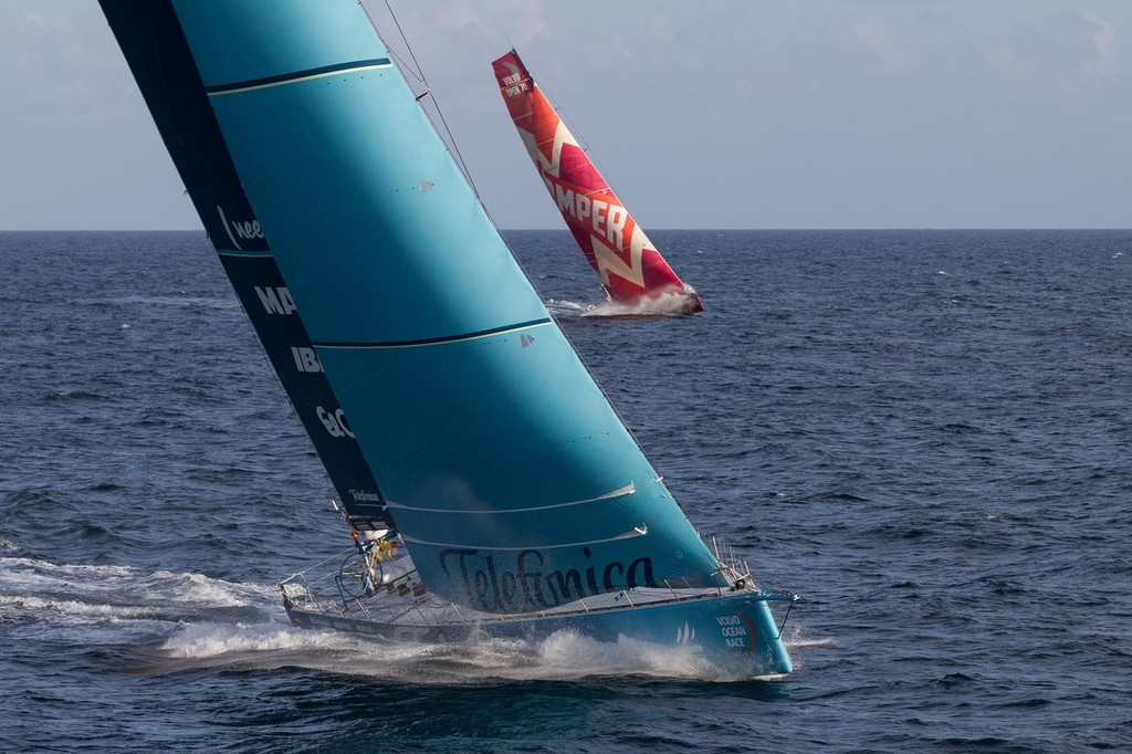 Team Telefonica leads Camper with Emirates Team New Zealand, at the start of leg 9 of the Volvo Ocean Race 2011-12, from Lorient, France to Galway, Ireland.  © Ian Roman/Volvo Ocean Race http://www.volvooceanrace.com