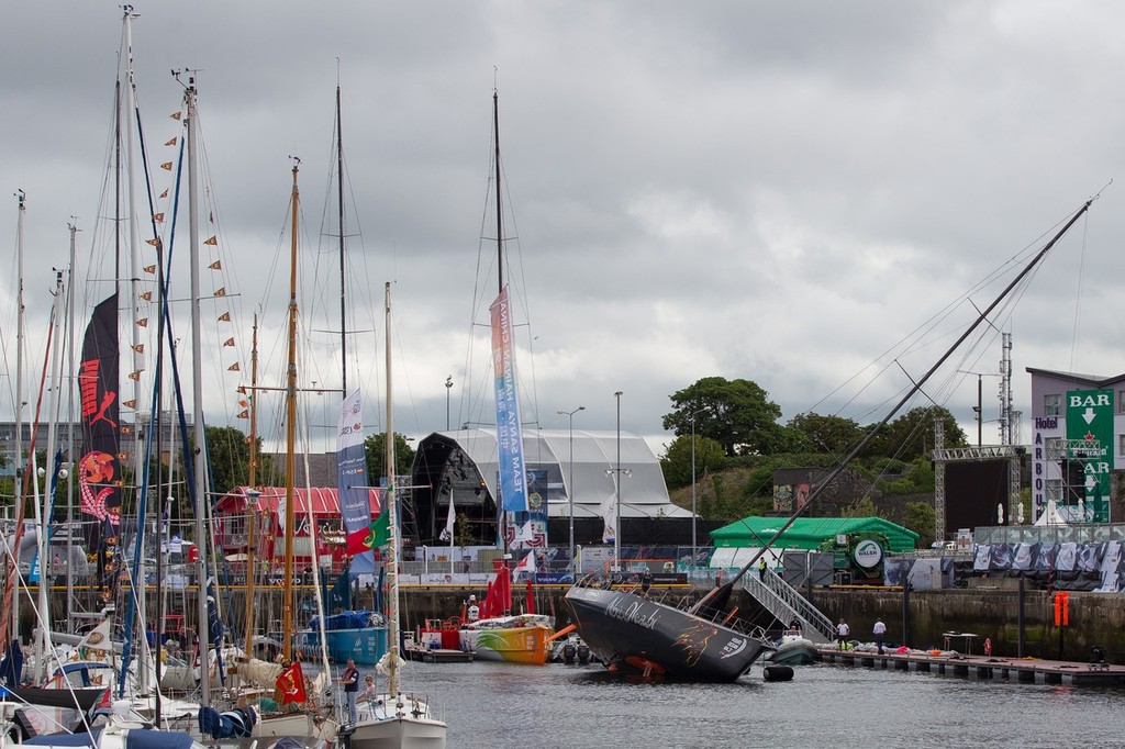 Abu Dhabi Ocean Racing make repairs to their damaged keel fairing in the Volvo Ocean Race village, in Galway, Ireland, during the Volvo Ocean Race 2011-12.  © Ian Roman/Volvo Ocean Race http://www.volvooceanrace.com