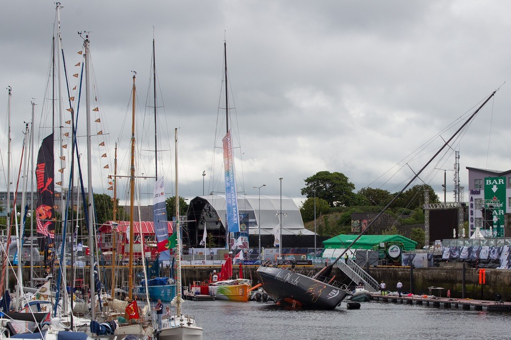 Abu Dhabi Ocean Racing make repairs to their damaged keel fairing in the Volvo Ocean Race village, in Galway, Ireland, during the Volvo Ocean Race 2011-12. (Credit: IAN ROMAN/Volvo Ocean Race) photo copyright Ian Roman/Volvo Ocean Race http://www.volvooceanrace.com taken at  and featuring the  class