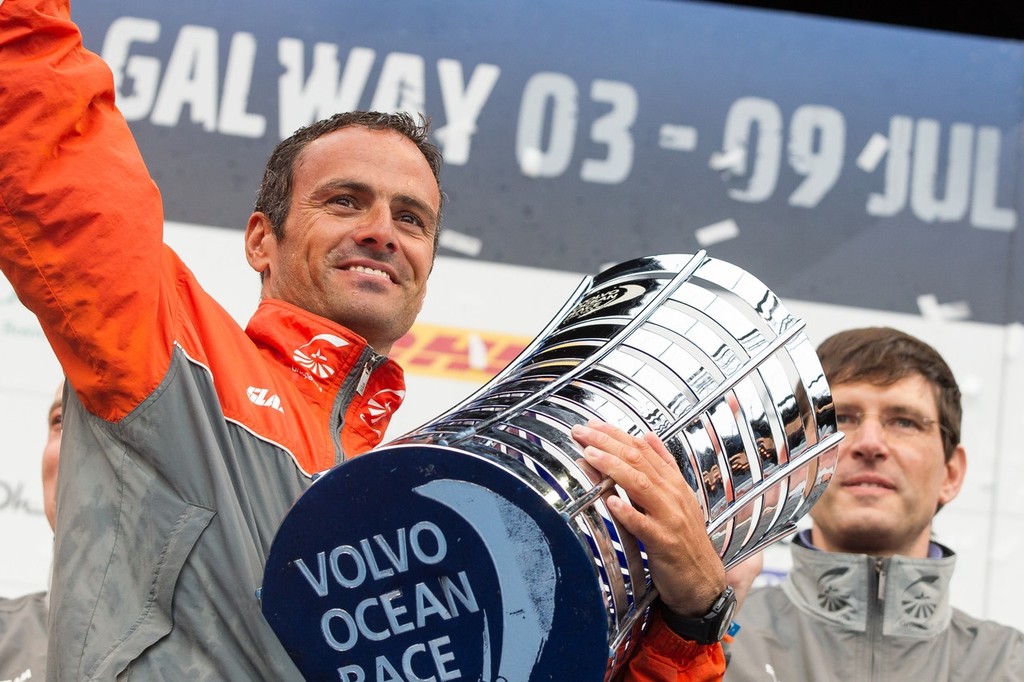 Groupama Sailing Team, skipper Franck Cammas from France, lifts the Volvo Ocean Race trophy, claiming first place overall in the Volvo Ocean Race 2011-12 © Ian Roman/Volvo Ocean Race http://www.volvooceanrace.com