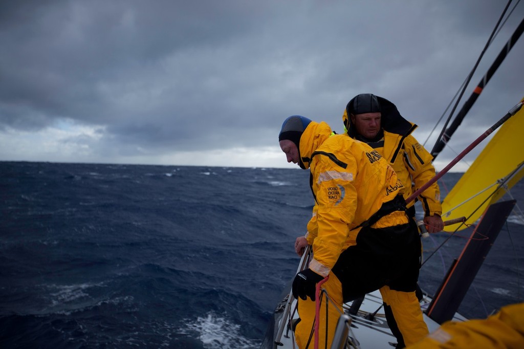 Justin Slattery and Anthony Nossiter prepare to check the delamination damage sustained to Abu Dhabi Ocean Racing during leg 5 of the Volvo Ocean Race 2011-12, from Auckland, New Zealand to Itajai, Brazil.  © Nick Dana/Abu Dhabi Ocean Racing /Volvo Ocean Race http://www.volvooceanrace.org