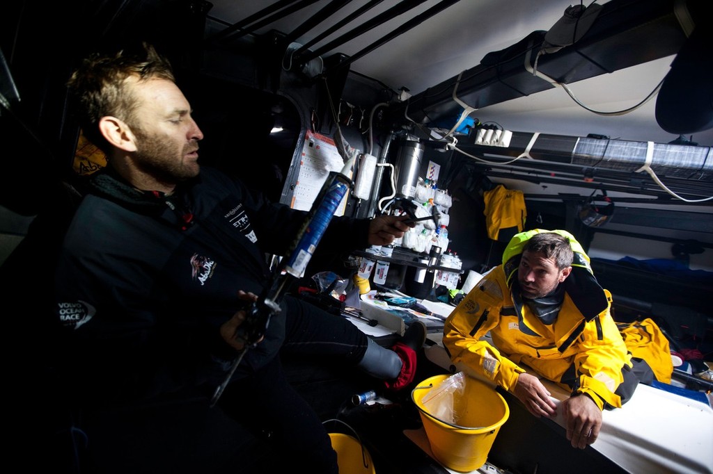 Jules Salter and Simon Fisher prepare glue for fixing delamination damage, sustained to Abu Dhabi Ocean Racing during leg 5 of the Volvo Ocean Race 2011-12, from Auckland, New Zealand to Itajai, Brazil.  © Nick Dana/Abu Dhabi Ocean Racing /Volvo Ocean Race http://www.volvooceanrace.org