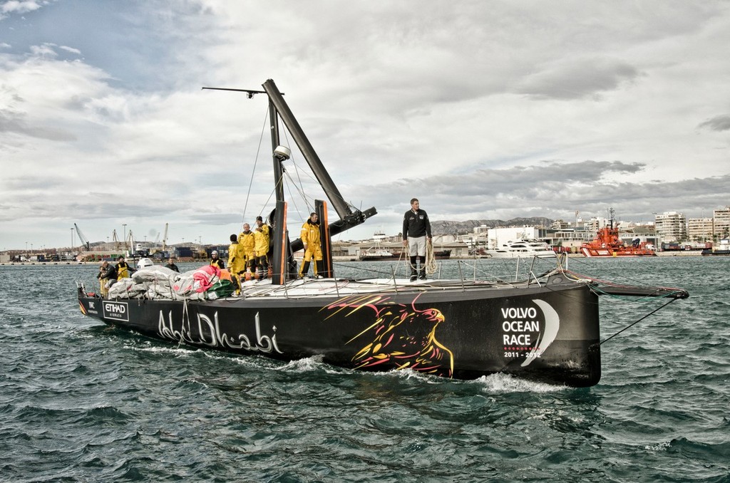 Abu Dhabi Ocean Racing&rsquo;s yacht Azzam, skippered by Britain&rsquo;s Ian Walker, returns to Alicante, Spain after the mast broke in rough weather on the first day of racing on leg 1 of the Volvo Ocean Race 2011-12.  &copy;  Marc Bow / Volvo Ocean Race