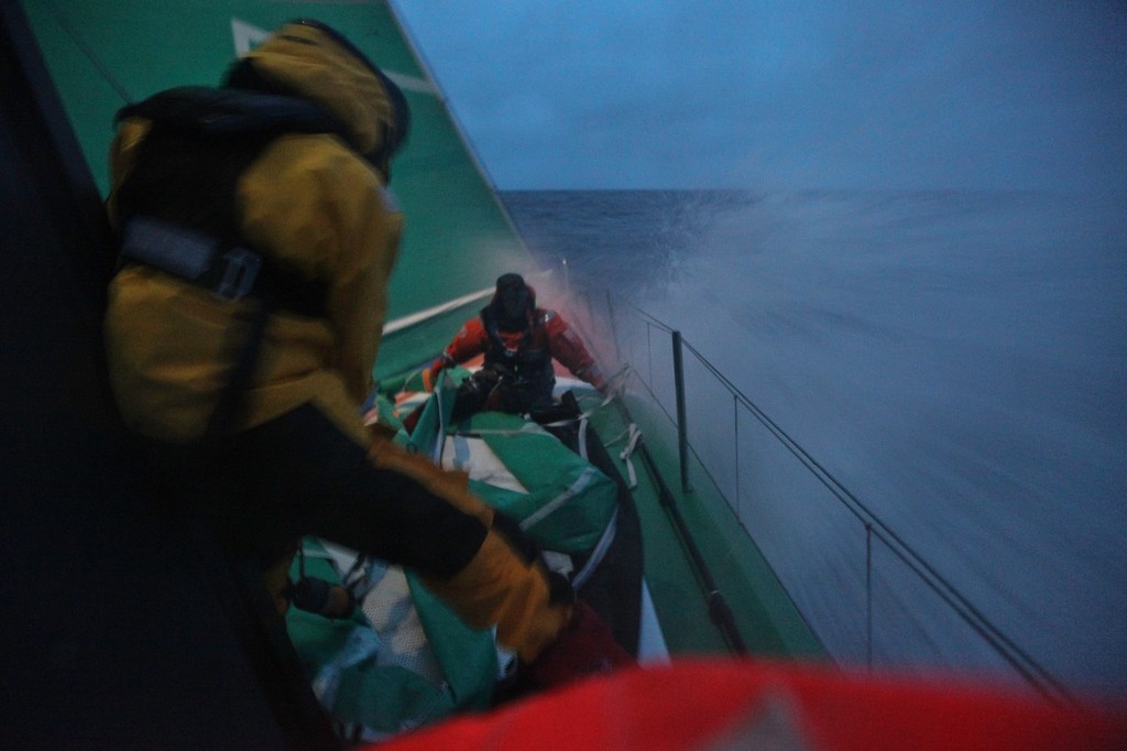 Martin Krite and Brad Marsh setting up the J4 during high speed sailing onboard Groupama Sailing Team during leg 5 of the Volvo Ocean Race 2011-12, from Auckland, New Zealand to Itajai, Brazil.  © Yann Riou/Groupama Sailing Team /Volvo Ocean Race http://www.cammas-groupama.com/