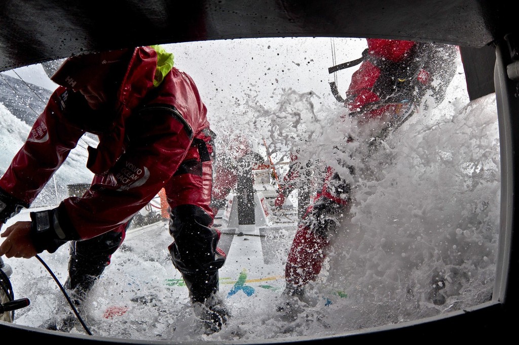 Dave Swete and Bert Schandevyl working the pit, onboard Team Sanya during leg 8 of the Volvo Ocean Race 2011-12, from Lisbon, Portugal to Lorient, France. (Credit: Andres Soriano/Team Sanya/Volvo Ocean Race) photo copyright Andrés Soriano/Team Sanya/Volvo taken at  and featuring the  class