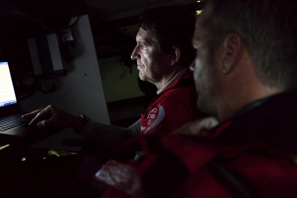 Skipper Chris Nicholson and Navigator Will Oxley in deep discussion about how hard to push Camper with Emirates Team New Zealand during leg 8 of the Volvo Ocean Race 2011-12, from Lisbon, Portugal to Lorient, France.  © Hamish Hooper/Camper ETNZ/Volvo Ocean Race