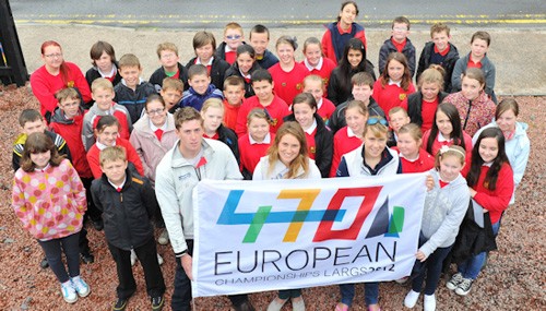 Largs school children with David Kohler, Anna Burnett/Flora Stewart - 470 European Championship 2012 ©  Rob Eyton-Jones