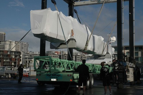 Emirates Team New Zealand - One of two hulls (stern to the left) arrives in the Viaduct Harbour, Auckland. © Emirates Team New Zealand http://www.etnzblog.com