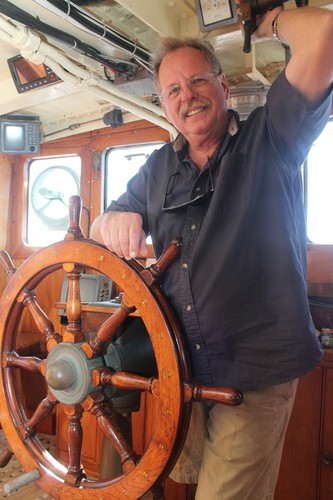 Captain David at the helm, retaining all of the charm while kitted up with the best of modern day technology. © SW