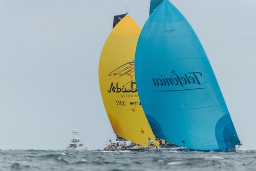 Team Telefonica, skippered by Iker Martinez from Spain and Abu Dhabi Ocean Racing fly their spinnakers as they jostle for first place in the PORTMIAMI In-Port Race, during the Volvo Ocean Race 2011-12.  © Paul Todd/Volvo Ocean Race http://www.volvooceanrace.com