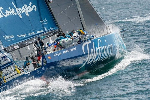 Team Telefonica, stacking up to the rail, at the start of leg 8 from Lisbon, Portugal to Lorient, France, during the Volvo Ocean Race 2011-12.  © Paul Todd/Volvo Ocean Race http://www.volvooceanrace.com