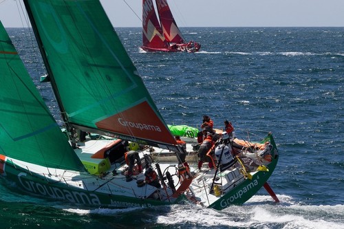 Groupama Sailing Team closing down on Camper with Emirates Team New Zealand, at the start of leg 9 of the Volvo Ocean Race 2011-12, from Lorient, France to Galway, Ireland.  © Ian Roman/Volvo Ocean Race http://www.volvooceanrace.com